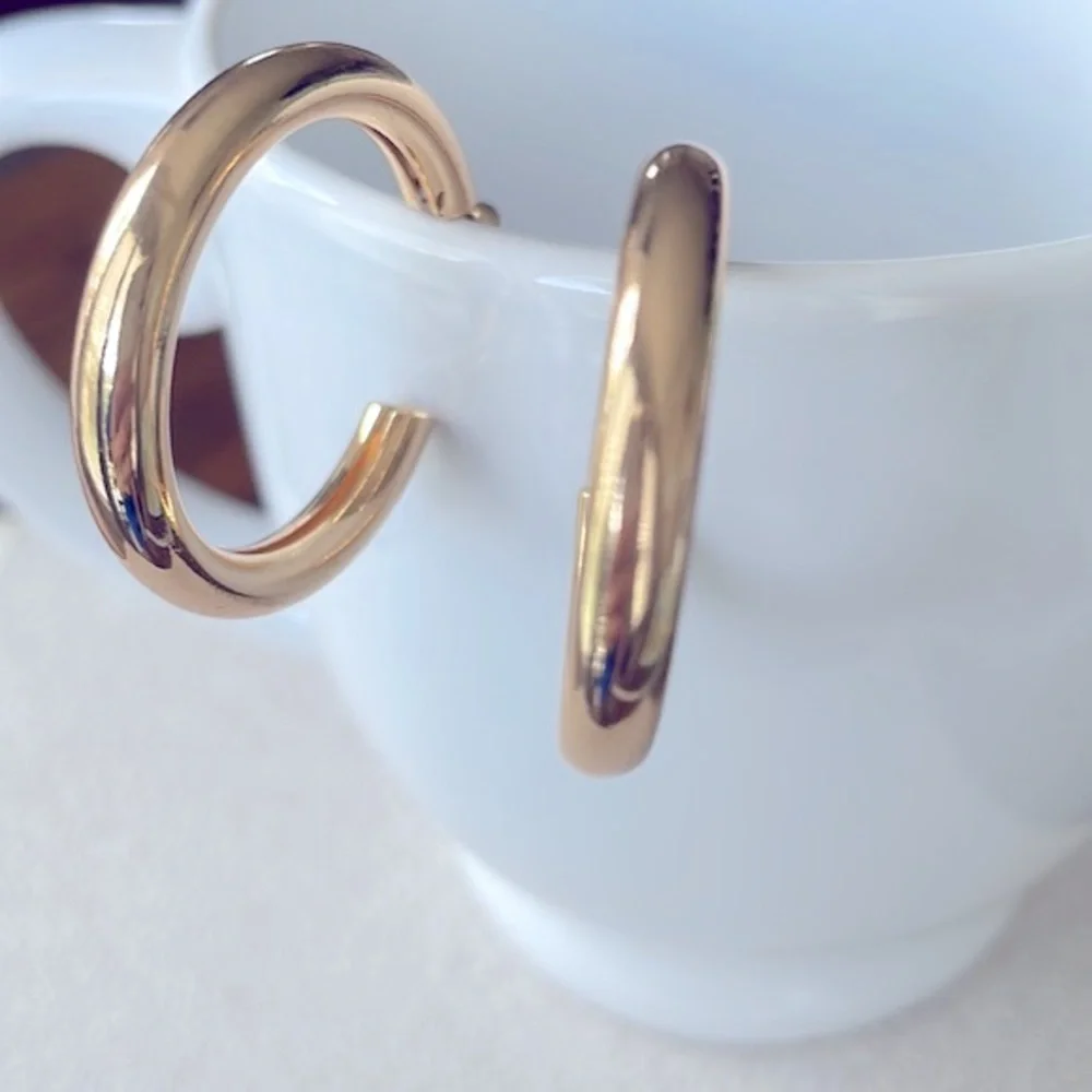 Thick gold hoop earrings